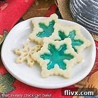 Sparkling stained glass cookies with colorful hard candy centers, perfect for hanging or gifting.