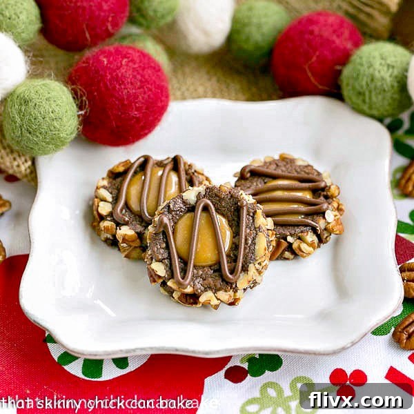 Chocolate thumbprint cookies rolled in pecans and filled with gooey caramel.