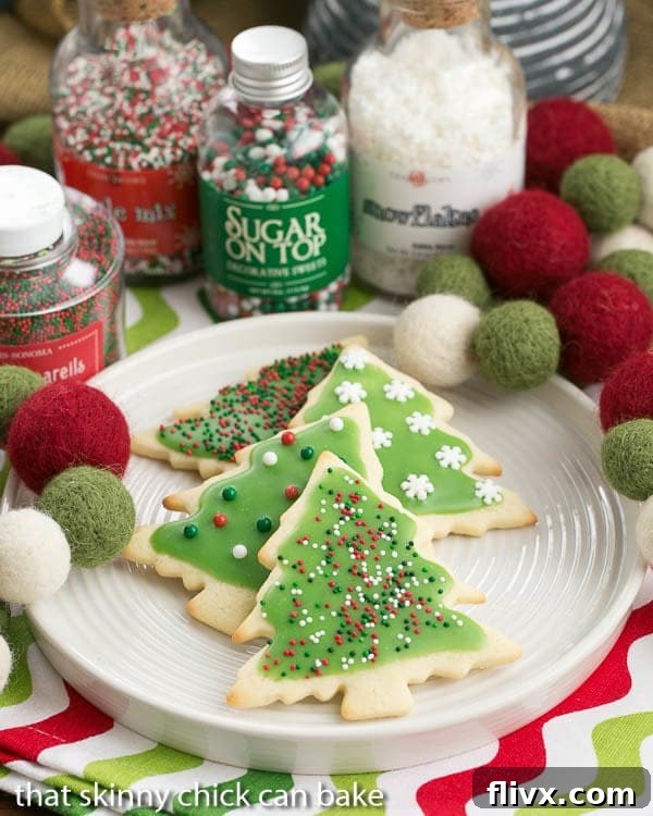 Best Sugar Cookies frosted on a white plate.