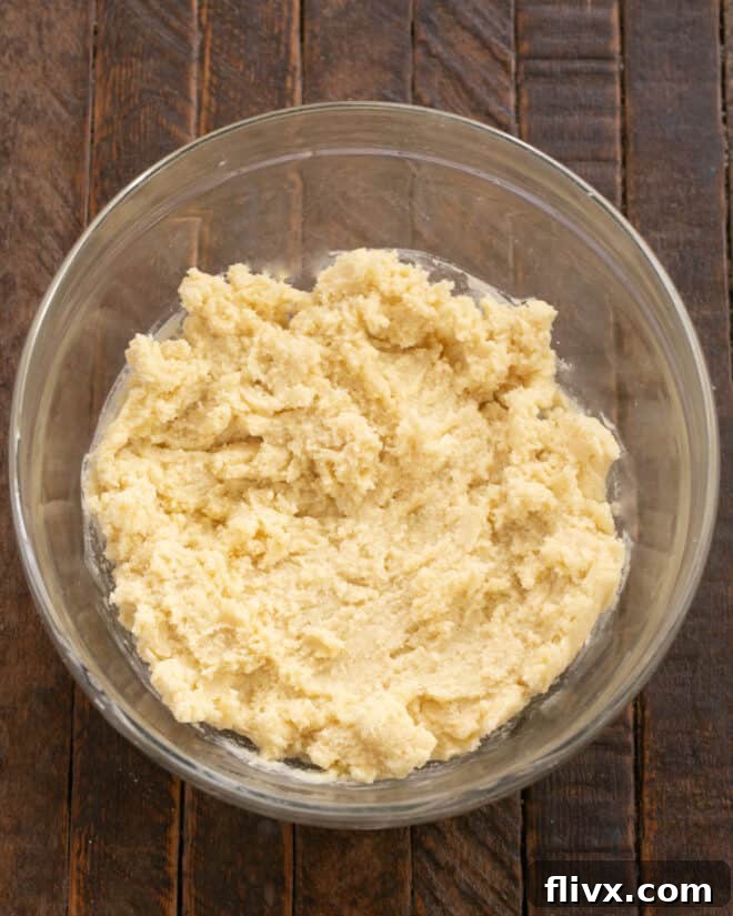 Mix in flour and baking powder.