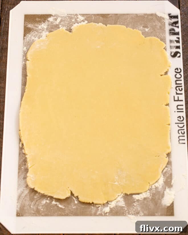 Dough rolled out on a Silpat.