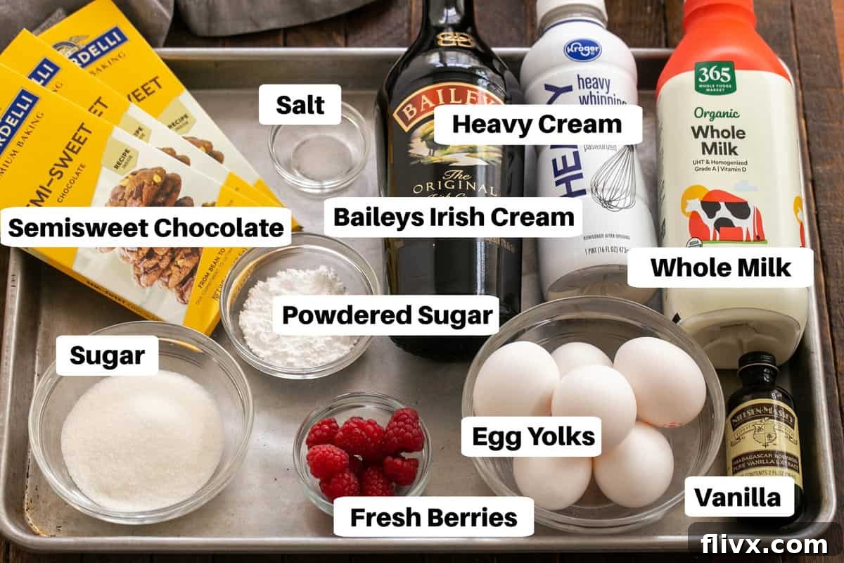 All the essential ingredients for making Irish Cream Pots de Creme laid out on a sheet pan, clearly labeled. Semisweet chocolate, whole milk, heavy cream, egg yolks, sugar, salt, vanilla extract, and Baileys Irish Cream are neatly arranged, ready for preparation.