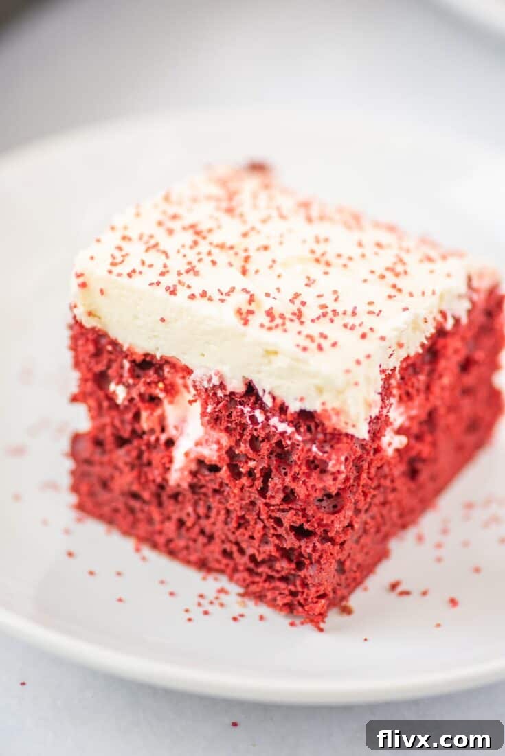 Easy Red Velvet Poke Cake with Cream Cheese Buttercream