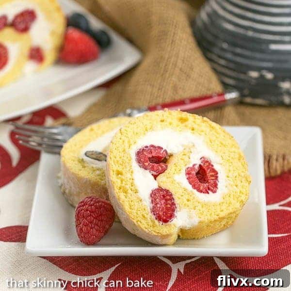 Berry Roulade | A jellyroll made with a sponge cake rolled around mascarpone cream and fresh berries.