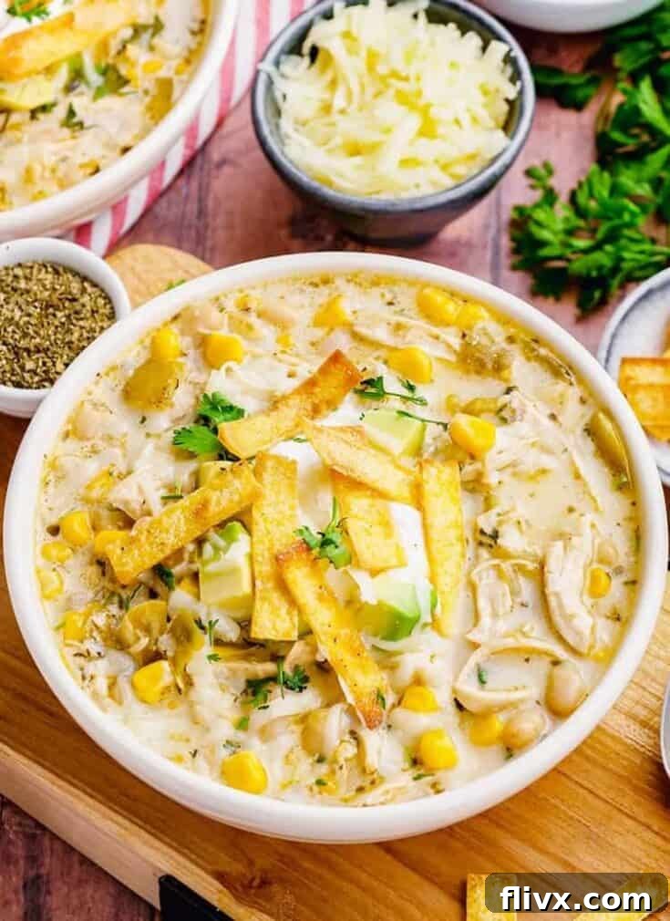 Rich White Chicken Chili with shredded chicken, corn, and white beans