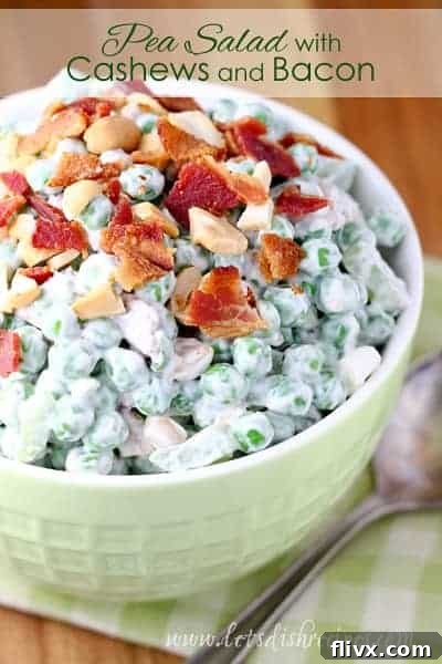 Flavorful Pea Salad with cashews and crispy bacon bits.