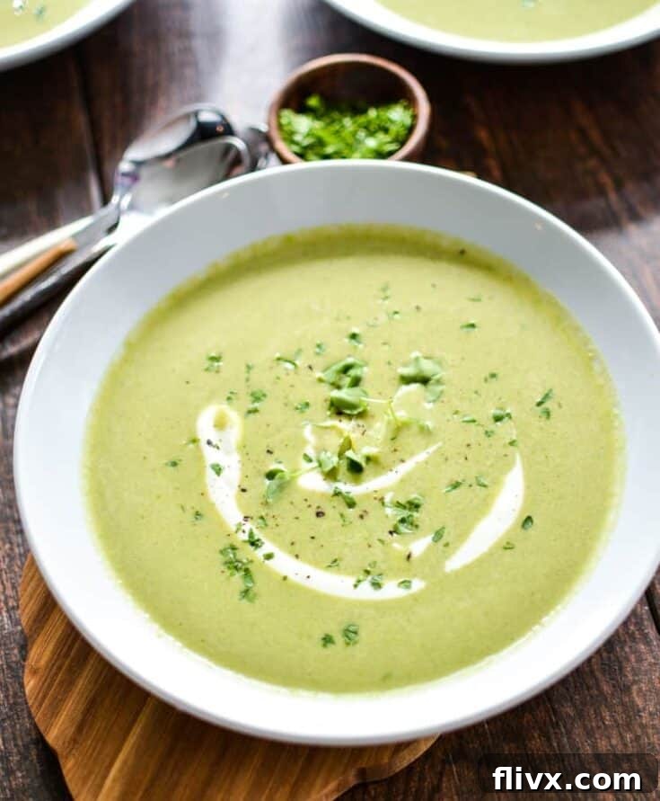 Luscious Creamy Asparagus and Watercress Spring Pea Soup, a vibrant vegan option.