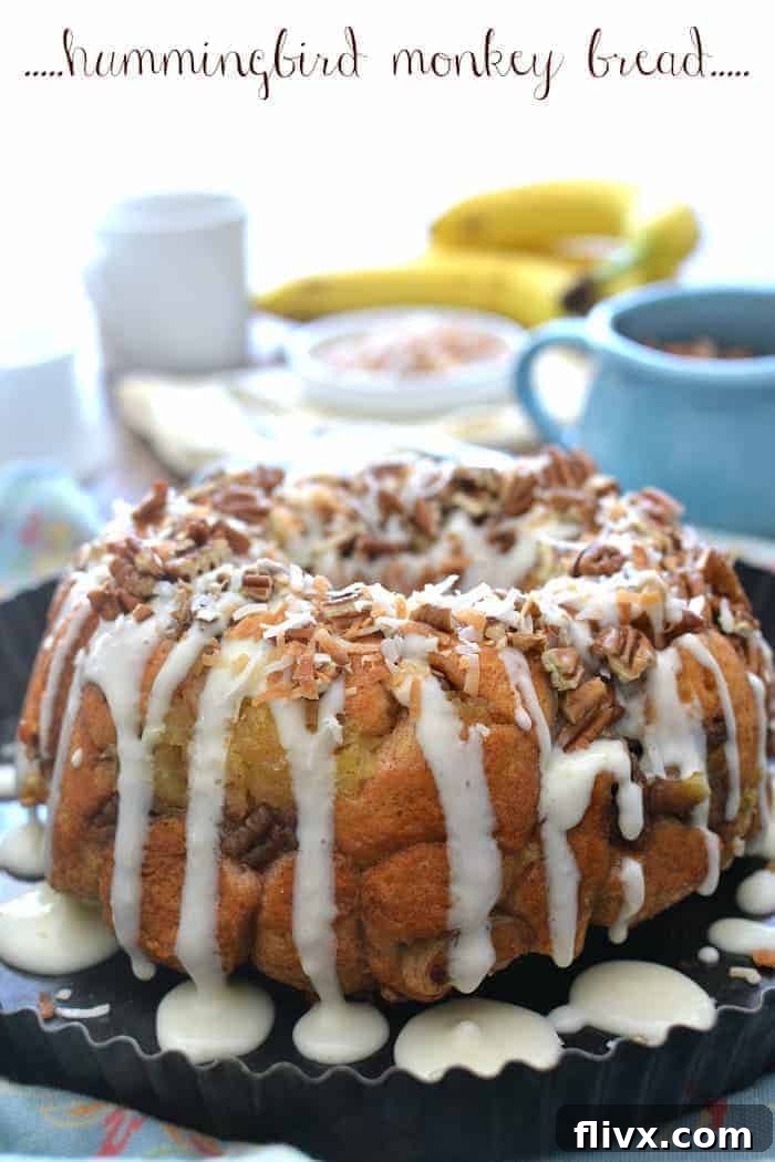 Sweet and tropical Hummingbird Monkey Bread with coconut, bananas, and pineapple.