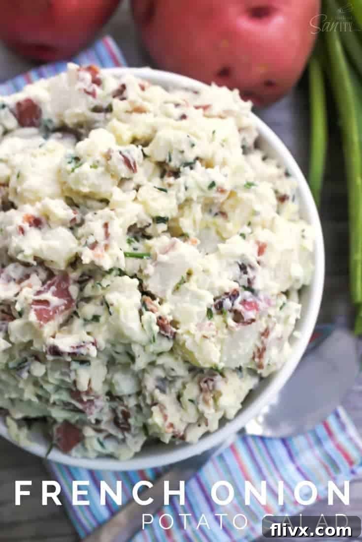 Delicious French Onion Potato Salad with bacon bits and a creamy dressing.