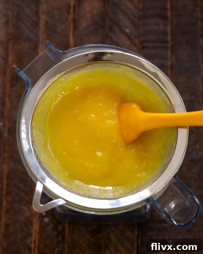 Step 6: Make, then strain lemon custard using a double boiler.