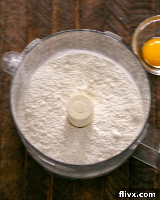 Step 1: Mix dry crust ingredients in a food processor.