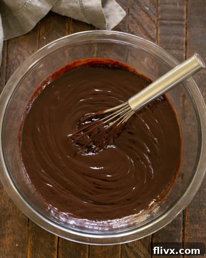 The Dark Nemesis 6 Step 3: Melting chopped chocolate and butter gently in a bowl for the La Bete Noire batter.