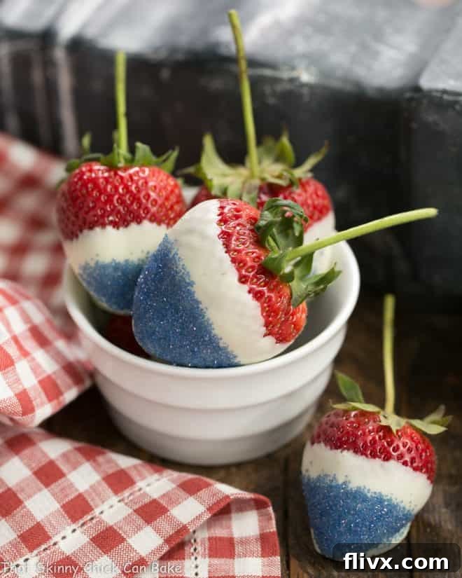 Sweet, juicy strawberries dipped in white chocolate then blue sugar to make a fun patriotic treat!