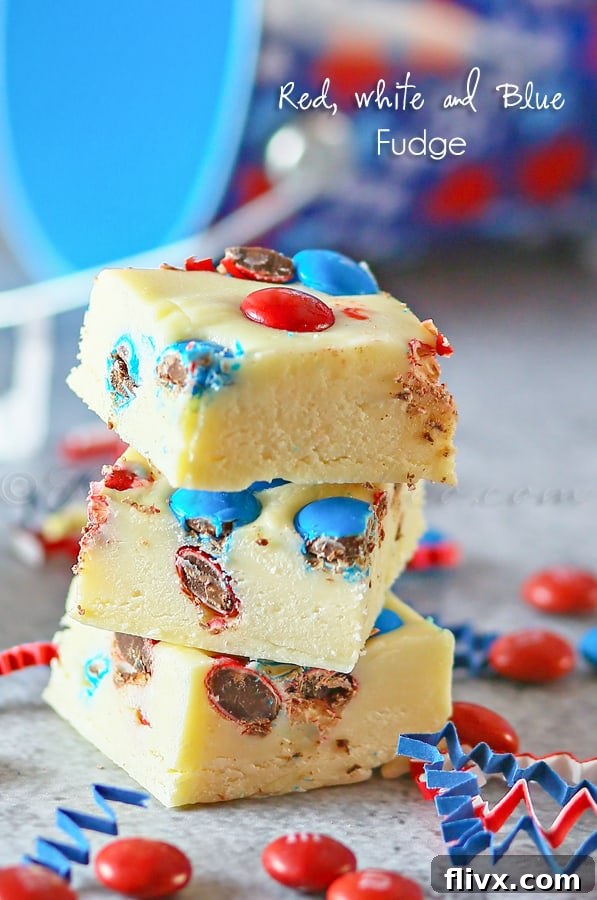 A tray of colorful red, white, and blue fudge squares.