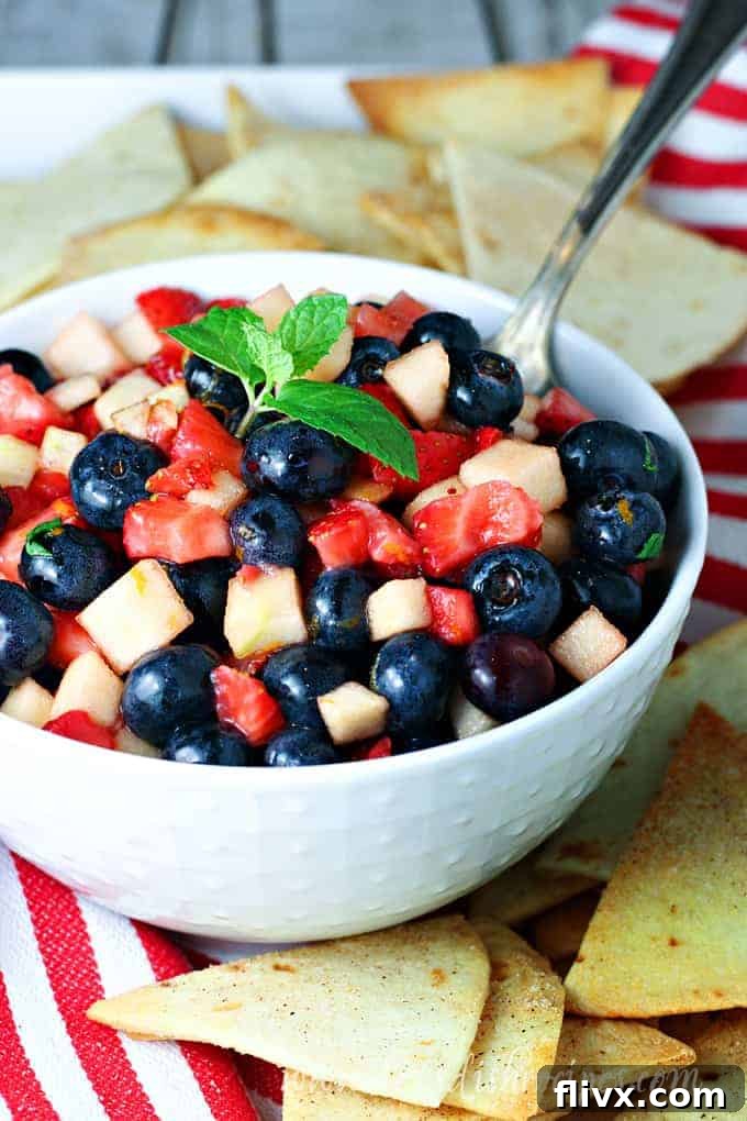 Festive fruit salsa with homemade cinnamon chips, arranged in patriotic colors.