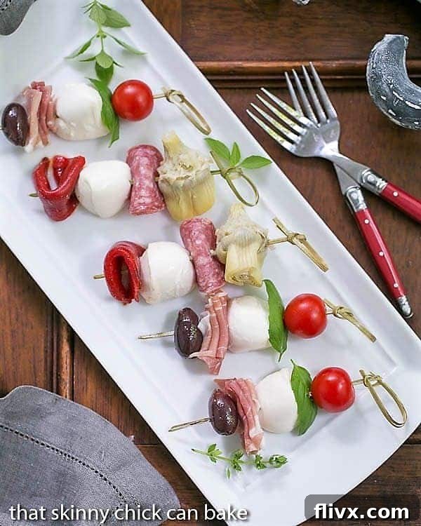 Antipasto Skewers on a rectangular white tray.