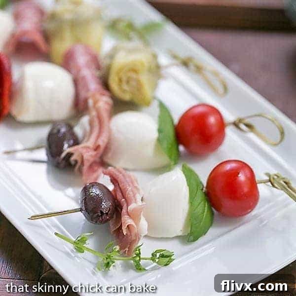 Close up of Antipasto Skewers on a white tray.