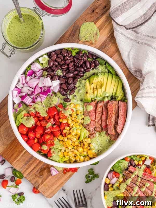 Southwestern Steak Salad, vibrant and colorful, drizzled with Jalapeno Ranch Dressing.