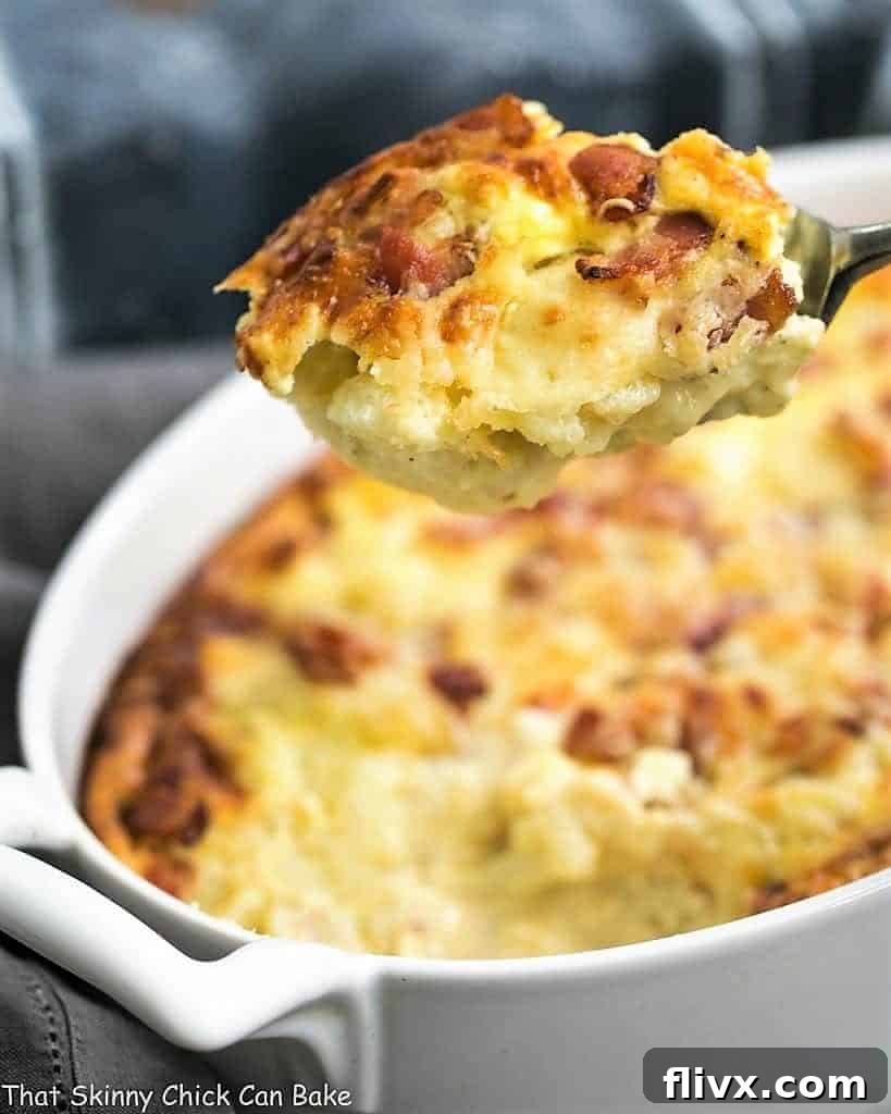 A close up of a spoonful of Cauliflower Gratin.