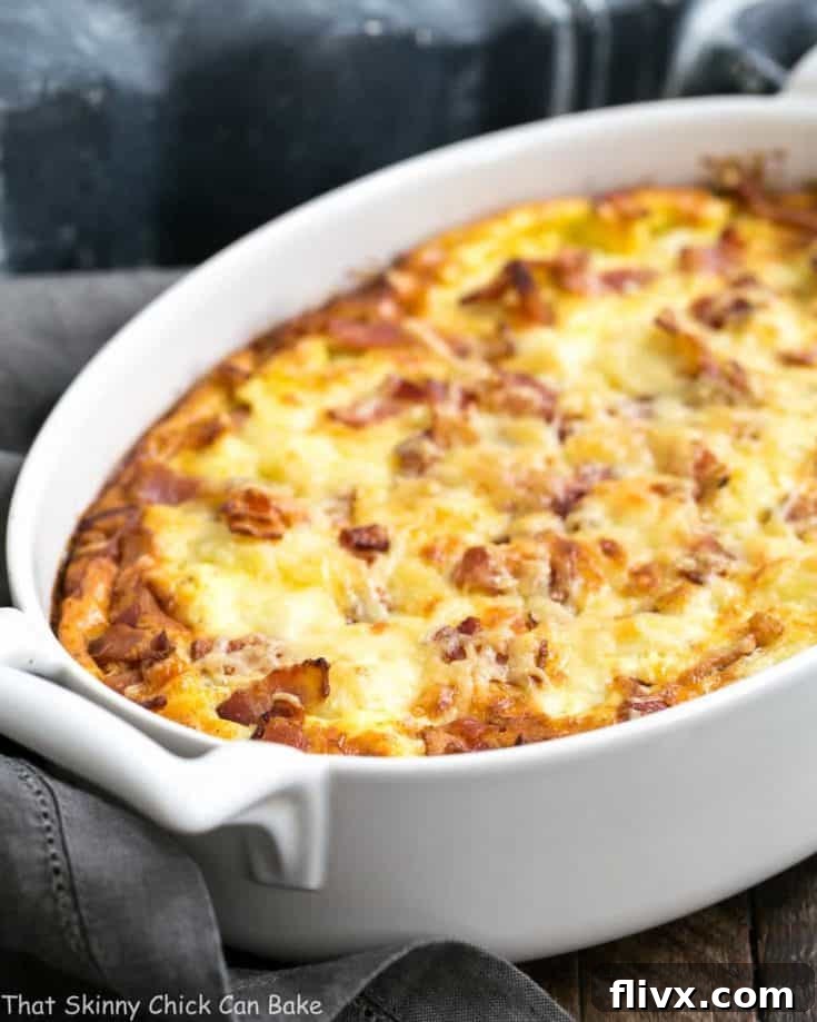 A close up of a cauliflower bacon gratin in a baking dish