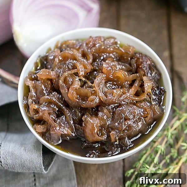 Rich, golden-brown Onion Marmalade served in an elegant white ceramic bowl, ready to elevate any dish.