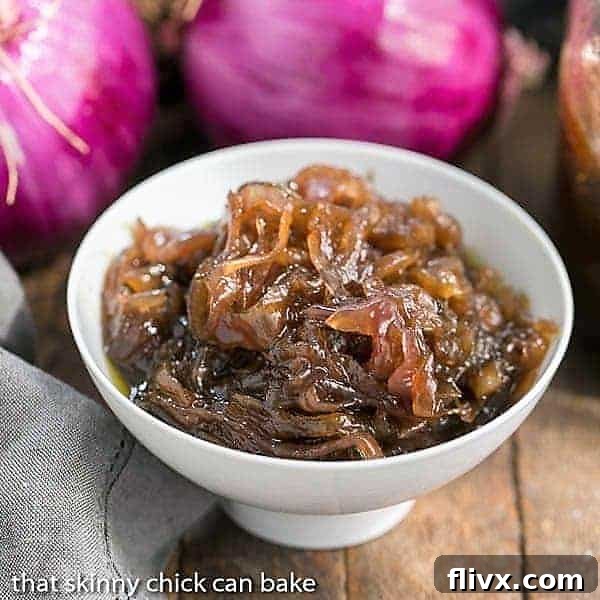 A close-up shot of French Onion Marmalade, rich with caramelized red onions, nestled in a pristine white bowl.