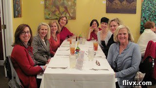 Neighbor ladies around a table while out for lunch during a holiday cookie exchange