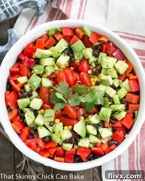 Overhead view of a Tex-Mex Fiesta Salad in a white salad bowl