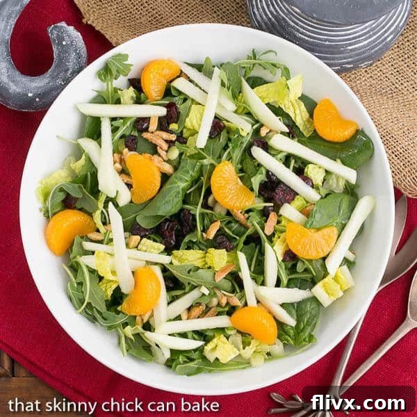 Overhead view of Holiday Lettuce Salad in a white bowl