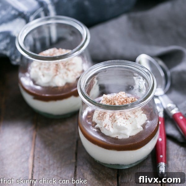 A trio of Fudgy Tombstone Parfaits artfully arranged, showcasing their layered beauty and spooky tombstone cookie garnishes, ready for a Halloween party.
