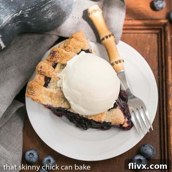 Golden-brown Freeze and Bake Blueberry Pie with a perfectly baked crust and juicy blueberry filling.