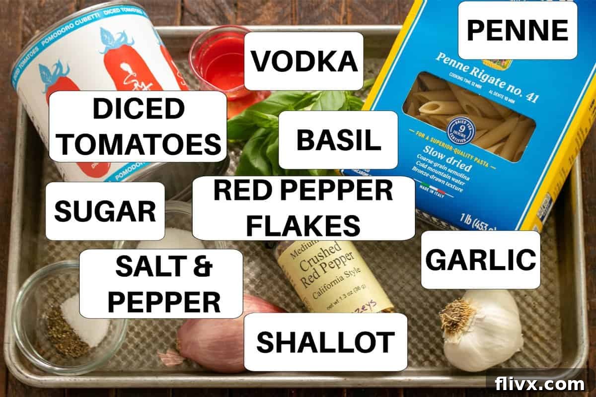 Penne alla Vodka Ingredients on a sheet pan with labels.