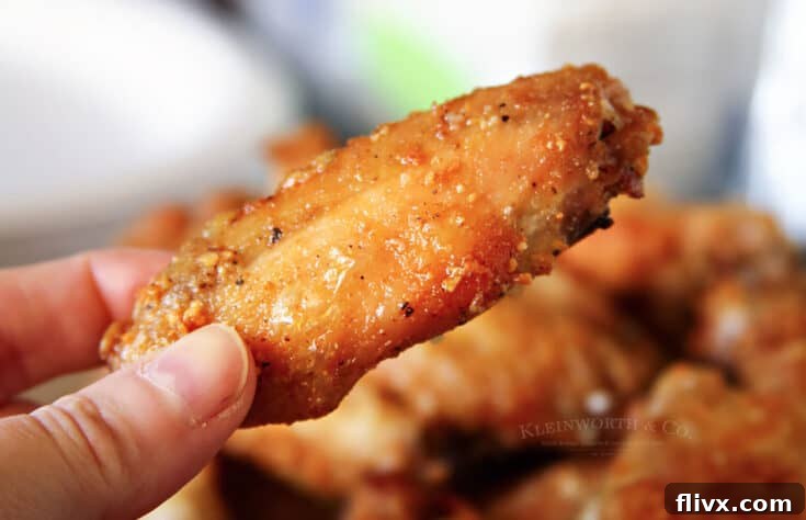 Garlic Parmesan Chicken Wings & Drumettes, perfectly golden and seasoned.