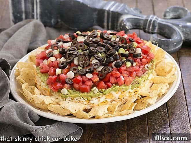 Easy Layered Taco Dip presented beautifully in a springform pan.