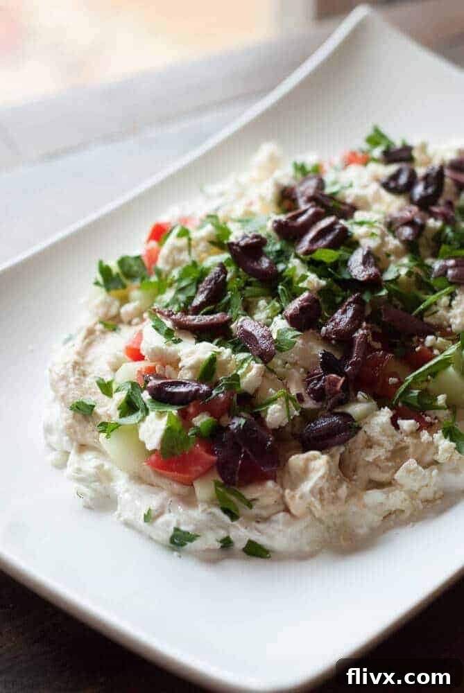 7 Layer Mediterranean Dip with fresh ingredients.