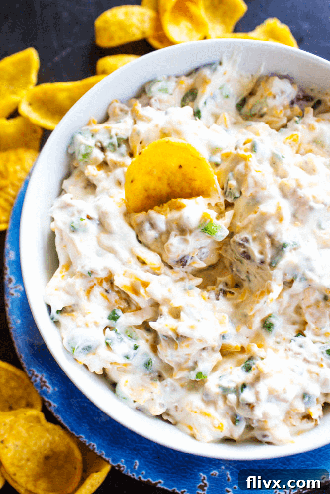 Bacon Cheddar Ranch Dip, creamy and topped with bacon bits and cheddar.