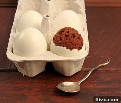 A bowl of food on a table, with Egg