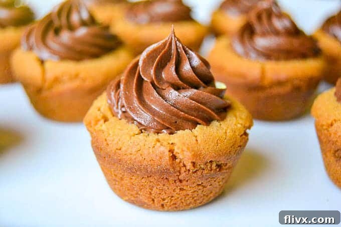 Frosted Peanut Butter Cookie Cups with chocolate swirl