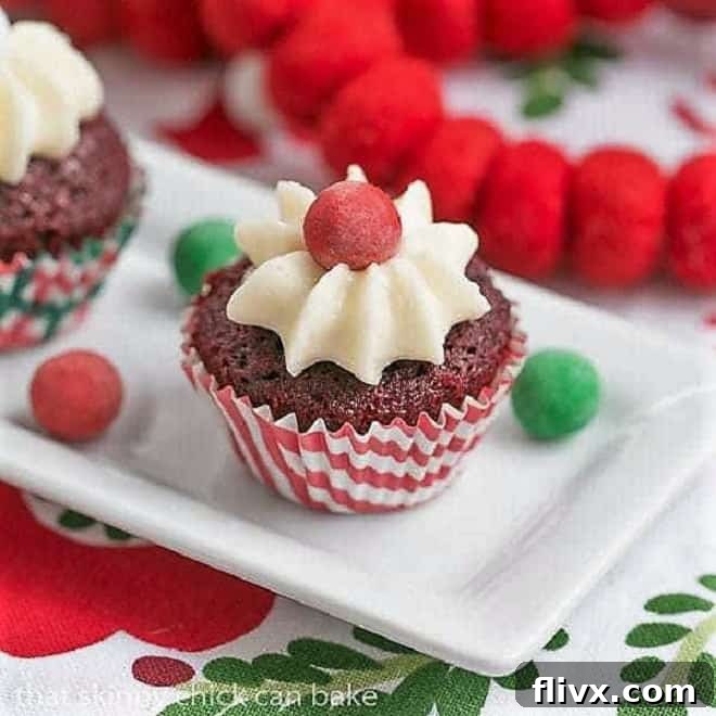 Mini Red Velvet Cupcakes on a white tray decked out for Christmas