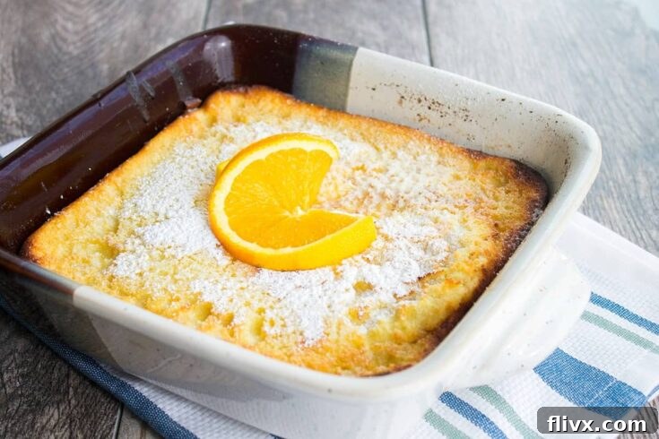 A golden orange ricotta Dutch baby pancake, puffed and ready to serve.