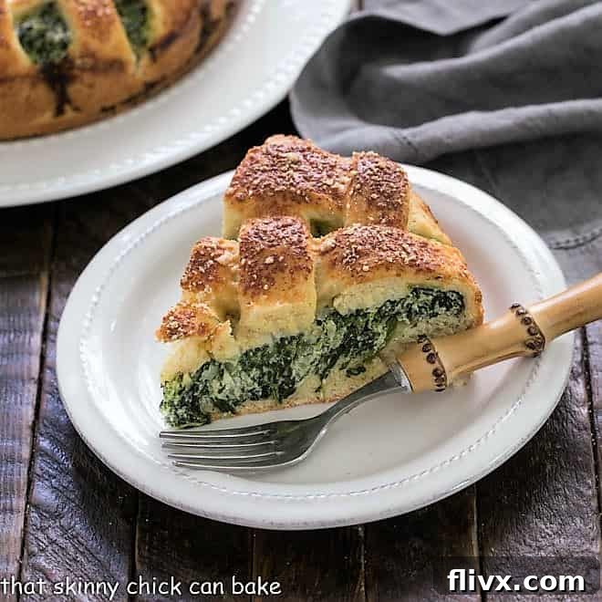 A savory Italian torta rustica filled with spinach and ricotta cheese, with a golden-brown crust.
