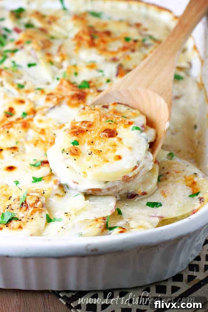 Creamy Parmesan scalloped potatoes baked until golden brown and bubbly.