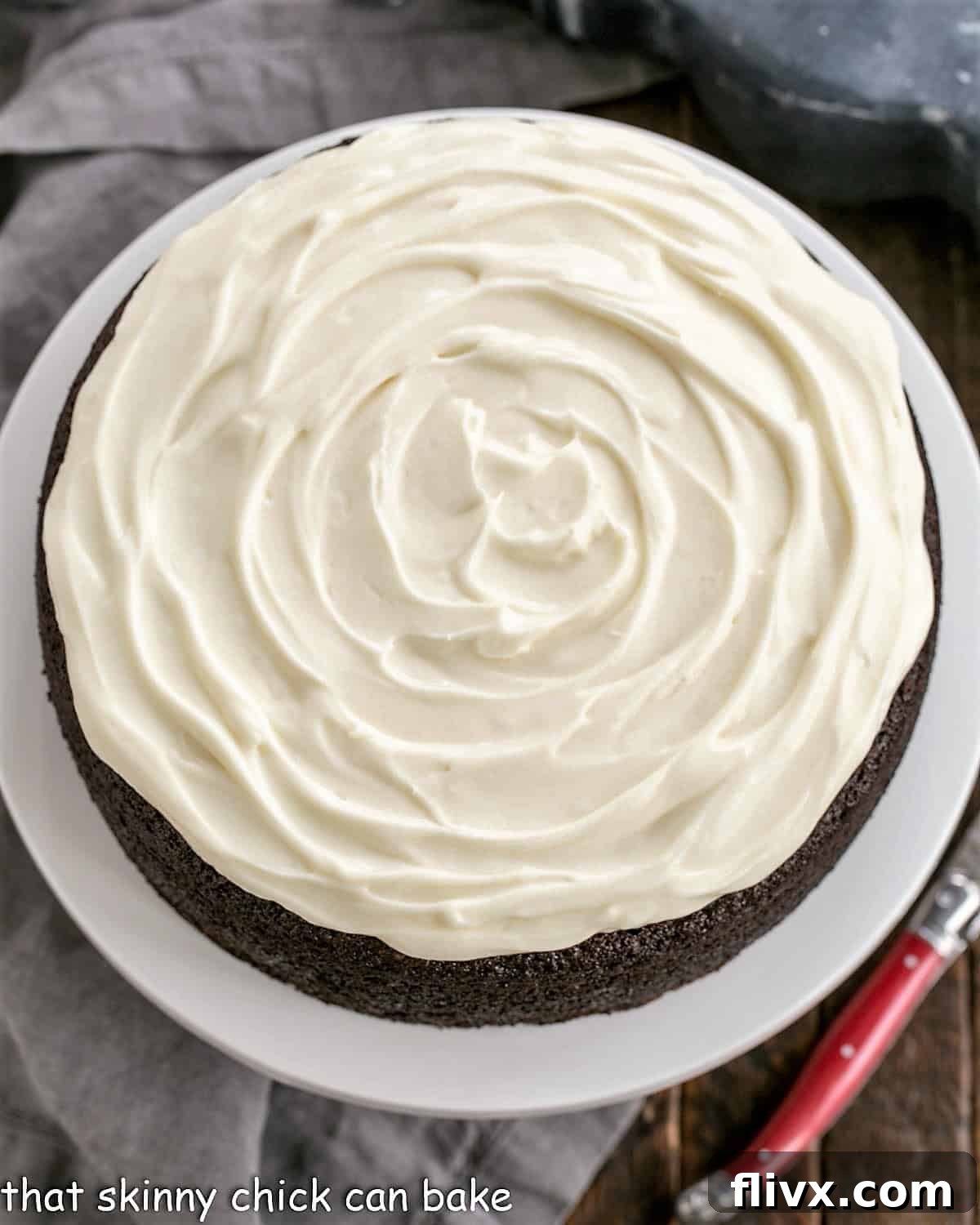 Close-up overhead image of a Chocolate Guinness Cake, showing the swirl pattern of the cream cheese frosting.