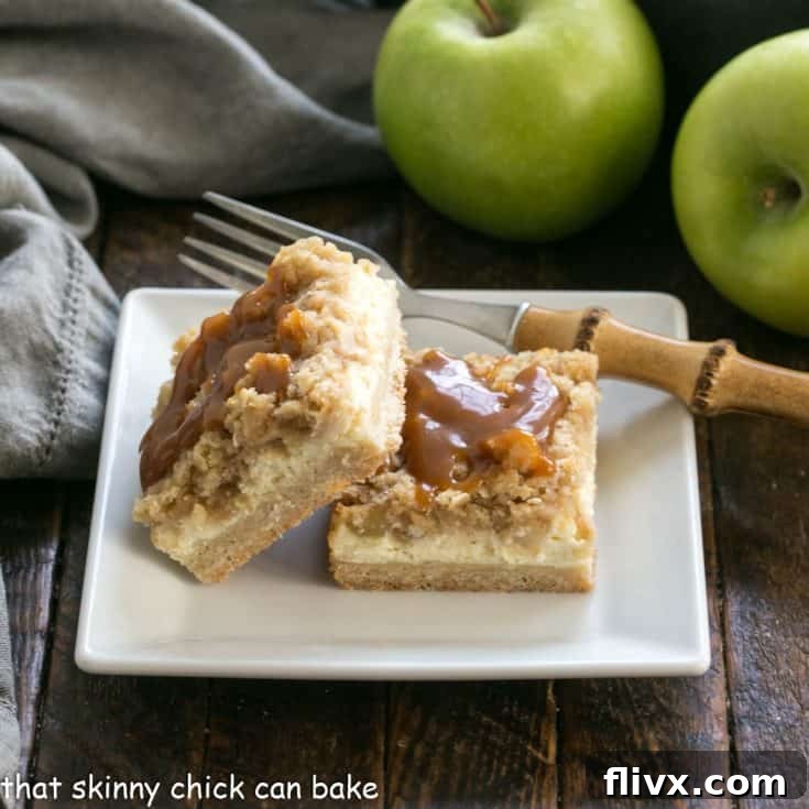 A beautifully presented Apple Cheesecake Bar on a clean square white plate, ready to be served.