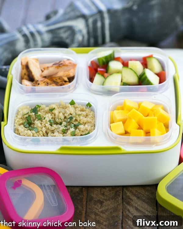 Caribbean Salmon Quinoa Salad assembled in a Rubbermaid Balance Meal Kit container, ready for consumption