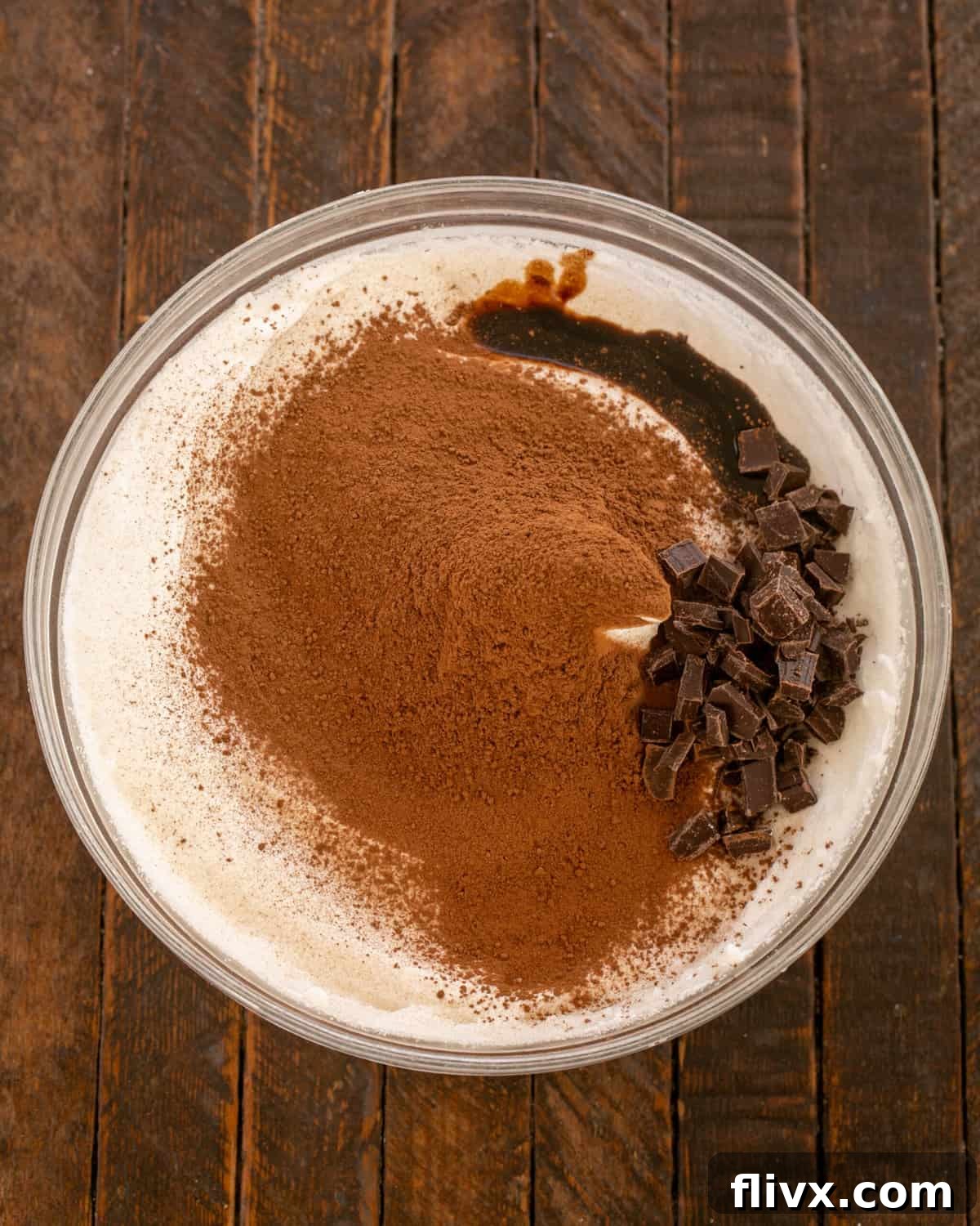 Cocoa powder, chopped chocolate, and balsamic vinegar added to the meringue mixture.