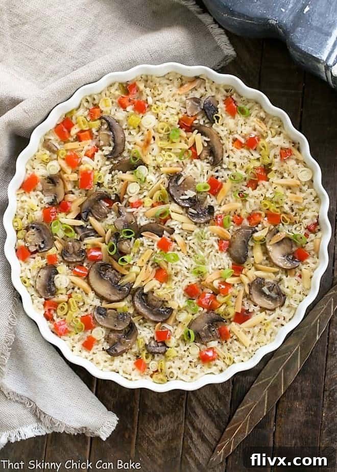 Overhead view of a beautifully presented Italian Rice Pilaf in a round casserole dish, ready to serve.