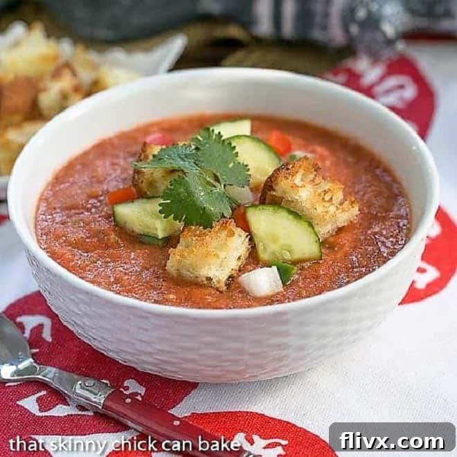 Classic Gazpacho with Homemade Croutons in a white ceramic bowl