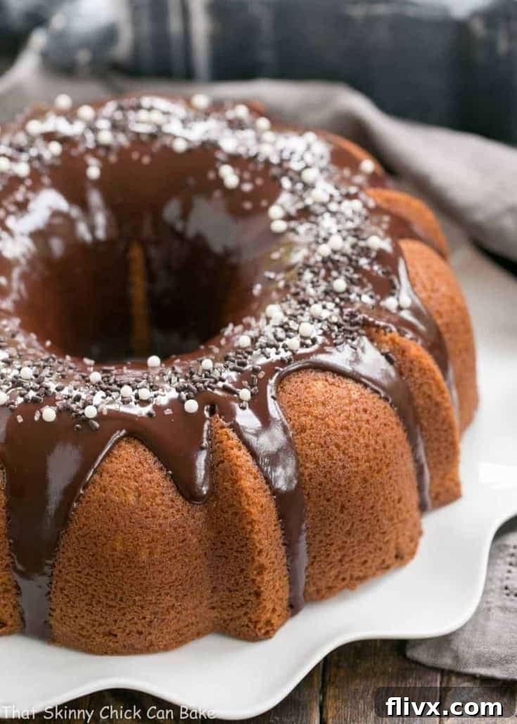 Tunnel of Fudge Cake | A rich butter cake with a fudgy ribbon in each slice. Make for Halloween as a Tunnel of Doom Cake!