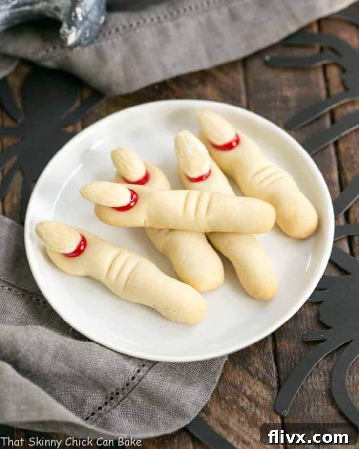 Witches Fingers Cookies displayed on a round white plate, ready for Halloween festivities.